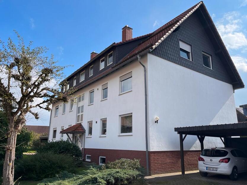 Dachgeschosswohnung in Mehrfamilienhaus zimmer